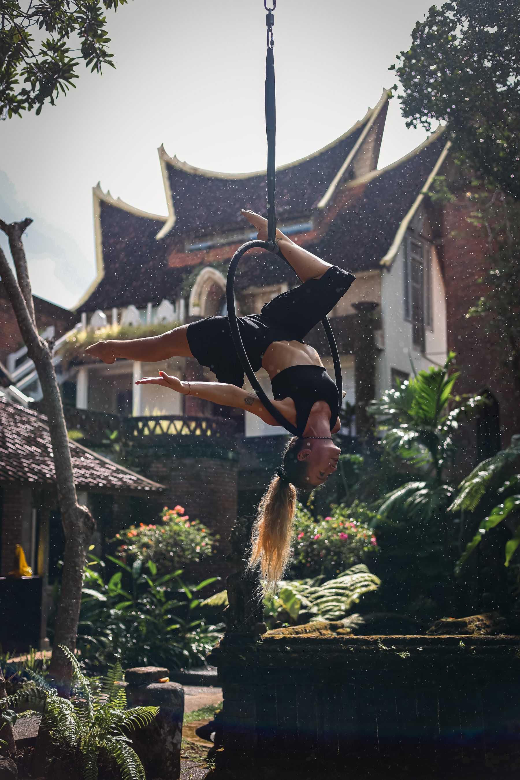 Aerial hoop performance in front of the castle