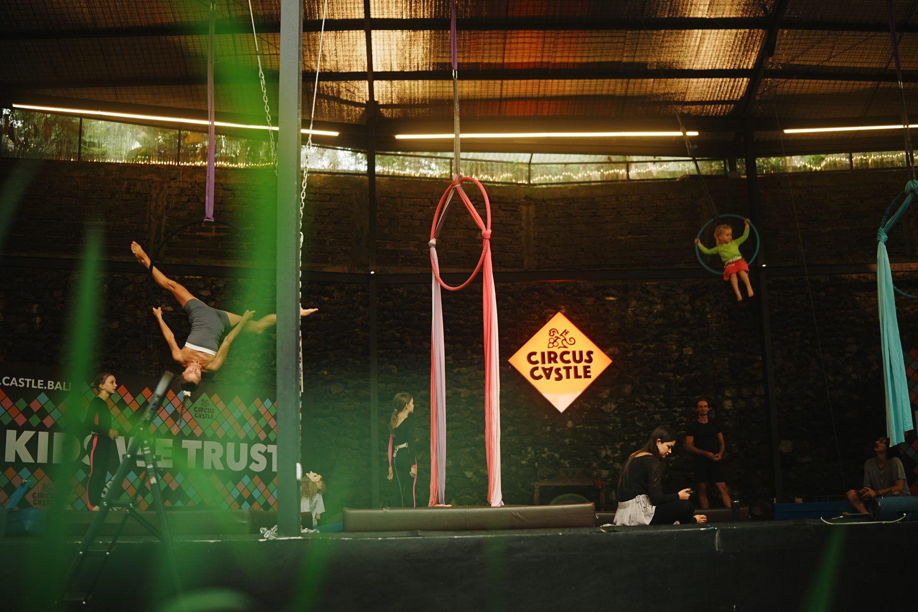 Adults training in the open-air aerial hall