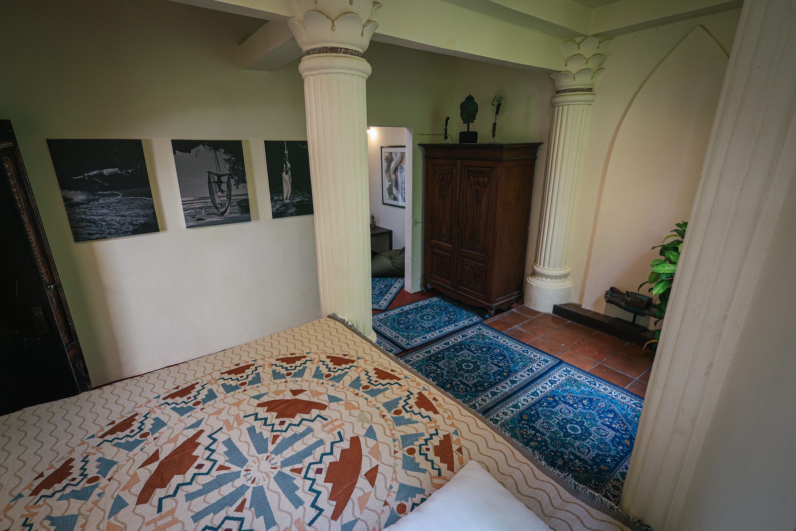 Bed and traditional textiles in a castle room