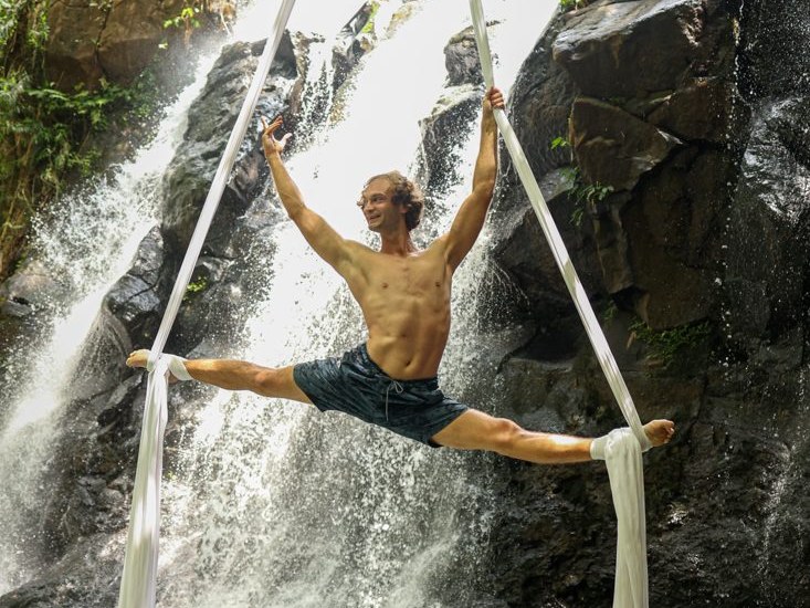 Dmitry, artistic director, on the aerial hoop at the Castle