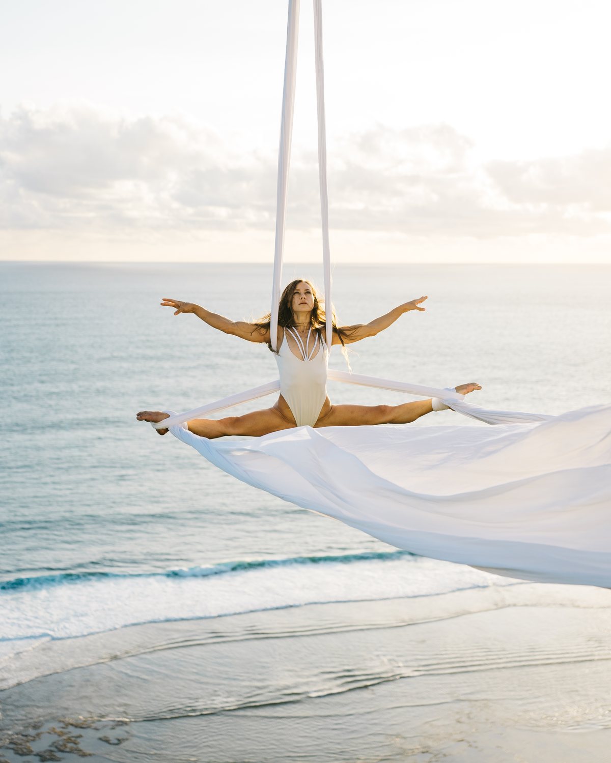 Katya, head coach, performing on aerial silks